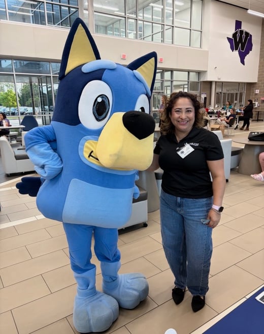 LSFHC Staff Poses with Bluey at a School Event